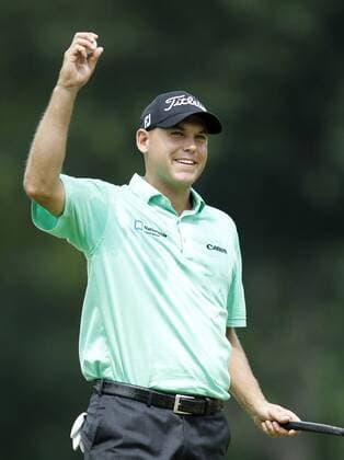 Bill Haas celebrates after sinking a putt on the 18th hole to win the AT&T National at Congressional Country Club on June 30, 2013 in Bethesda, Maryland.  WAP20130630833