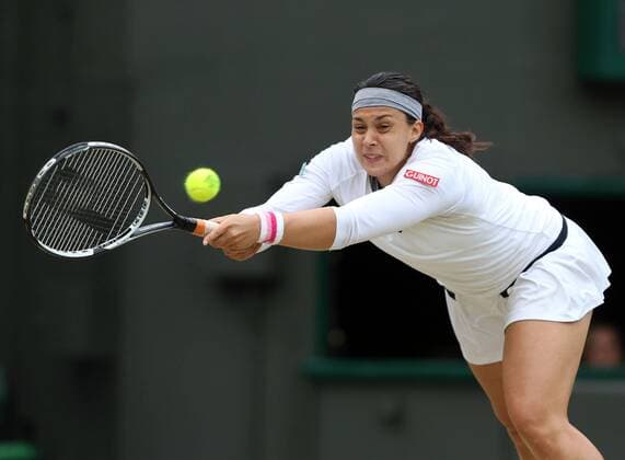 Wimbledon Championships 2013, AELTC,London, ITF Grand Slam Tennis Tournament, Marion Bartoli (FRA),Aktion,Einzelbild, Halbkoerper,Querformat,
