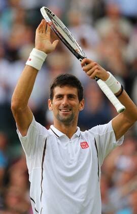 (130703) -- LONDON, July 3, 2013 (Xinhua) -- Novak Djokovic of Serbia celebrates victory after the quarterfinal of men s singles on day 9 of the Wimbledon Lawn Tennis Championships at the All England Lawn Tennis and Croquet Club in London, Britain, on July 3, 2013. (Xinhua Yin Gang) (jyc) (SP)BRITAIN-LONDON-TENNIS-WIMBLEDON-DAY 9 
