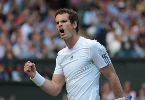 Great Britain s Andy Murray celebrates in his match against Spain s Fernando Verdasco on day nine of the 2013 Wimbledon Championships in London on July 03, 2013.  LON2013070302