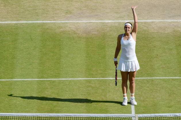 Tennis - 2013 Wimbledon Championships - Ladies Semi Final: Sabine Lisicki - Germany salutes the crowd after her win 