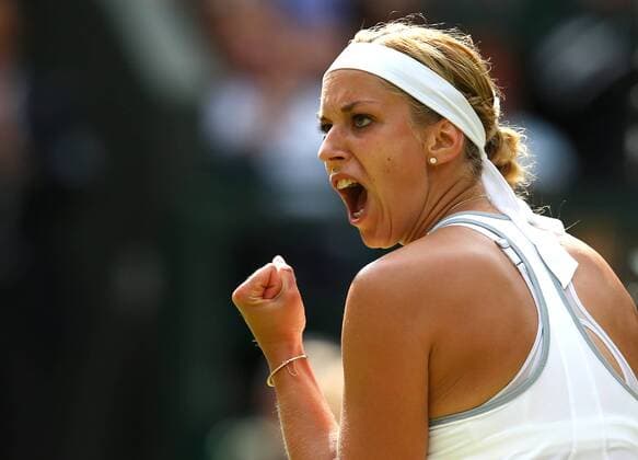 Sabine Lisicki of Germany reacts during the semifinal of ladies singles on day 10 of the Wimbledon Lawn Tennis Championships at the All England Lawn Tennis and Croquet Club in London, Britain on July 4, 2013. (Xinhua Yin Gang) (SP)BRITAIN-LONDON-TENNIS-WIMBLEDON-DAY 10 