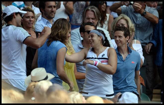 France s Marion Bartoli speaks to her family after winning her first Grand Slam title in the Women s Final at the Wimbledon Tennis Championships The All England Lawn Tennis Club, Wimbledon, United Kingdom Saturday, 6th July 2013 AndrewxParsonsx xi-Images  IIM-0190-0021