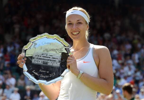 Tennis - 2013 Wimbledon Championships - Womens Final Sabine Lisicki shows off her runners up plate 
