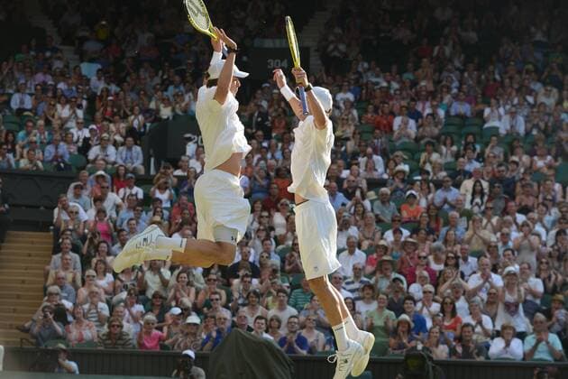 Tennis - 2013 Wimbledon Championships - Mens Doubles Final Centre Court Bob Bryan and Mike Bryan celebrate at match point 