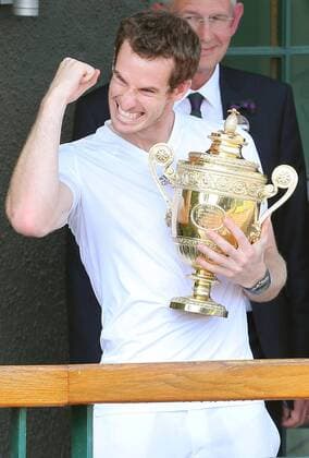 Andy Murray celebrates from the balcony of the All England Club after winning the Men s Final at the Wimbledon Tennis Championships in London, Sunday, 7th July 2013  IIM-0194-0049
