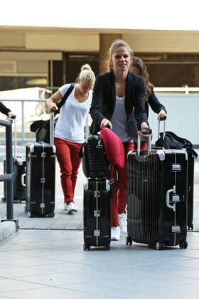 FRANKFURT AM MAIN, GERMANY - JULY 07: Team mates of Germany arrive for the Germany women s national team departure to Sweden at Frankfurt Airport on July 7, 2013 in Frankfurt am Main, Germany.