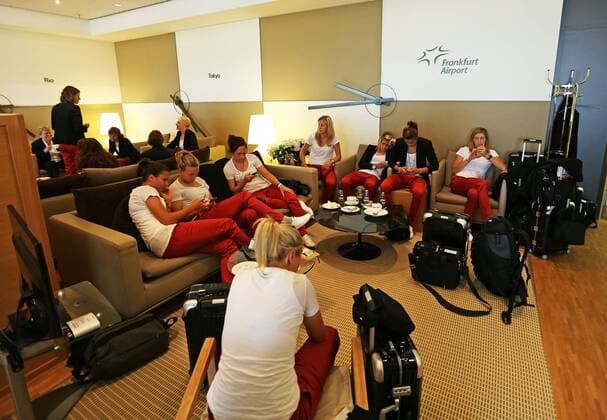 FRANKFURT AM MAIN, GERMANY - JULY 07: Team mates of Germany wait for their flight during the Germany women s national team departure to Sweden at Frankfurt Airport on July 7, 2013 in Frankfurt am Main, Germany.
