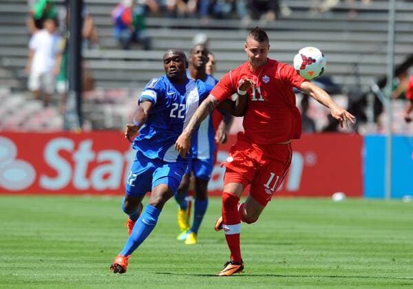07 July 2013: Defender Jean-Sylvain Babin (22) of Martinique and Forward Marcus Haber (11) of Canada fight for the ball during the CONCACAF Gold Cup soccer match between Canada and Martinique at the Rose Bowl in Pasadena, ca. SOCCER: JUL 07 CONCACAF Gold Cup - Canada v Martinique Icon0071307072333 EDITORIAL USE ONLY
