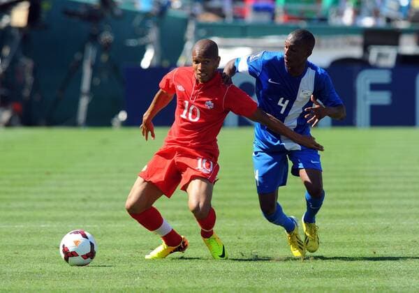 07 July 2013: Forward Simeon Jackson (10) of Canada and Midfielder Daniel Herelle (4) of Martinique fight for the ball during the CONCACAF Gold Cup soccer match between Canada and Martinique at the Rose Bowl in Pasadena, ca. SOCCER: JUL 07 CONCACAF Gold Cup - Canada v Martinique Icon0071307072361 EDITORIAL USE ONLY