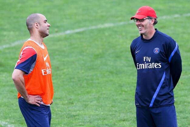 FUSSBALL - PSG, Training STEGERSBACH,AUSTRIA,11.JUL.13 - FUSSBALL - Ligue 1, Paris Saint-Germain FC, IFCS Trainingslager. Bild zeigt Alex und Trainer Laurent Blanc (PSG). 