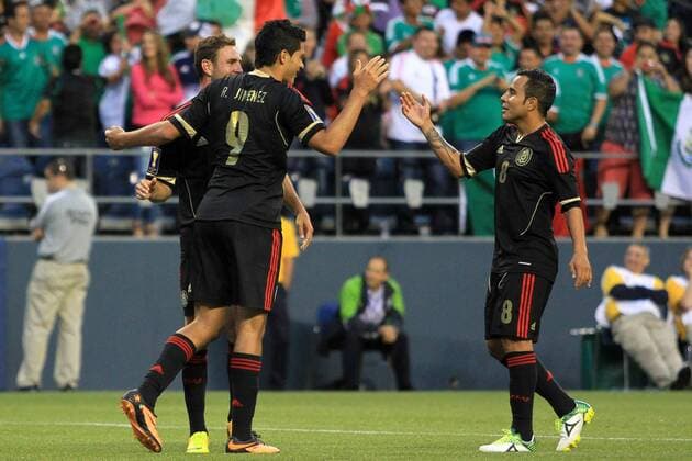 SEATTLE, July 11, 2013 - Mexico s Raul Jimenez (C) celebrates his goal with his teammates Miguel Layun (L) and Luis Montes during the Gold Cup 2013 match between Mexico and Canada in Seattle, the United States, on July 11, 2013. (Xinhua Alfredo Lopez Jam Media) (itm) (sp) (SP)US-SEATTLE-SOCCER-GOLD CUP-MEXICO VS CANADA 