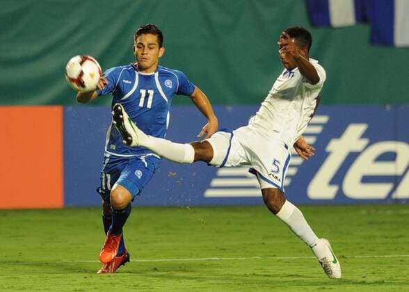 July 12, 2013: Honduras Jose Velazquez Colon (5) and Salvador Rodolfo Zelaya Garcia (11) in action during the Honduras v Salvador in the CONCACAF Gold Cup Game at Sun Life Stadium in Miami Gardens, Florida. SOCCER: JUL 12 CONCACAF Gold Cup - Honduras v El Salvador Icon130712004 EDITORIAL USE ONLY