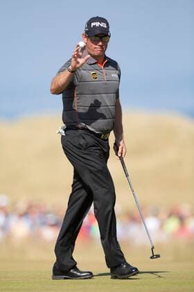 Golf - 2013 Open Championship at Muirfield - Friday Round Two Lee Westwood of England acknowledges the crowds applause following his putt on the 5th 