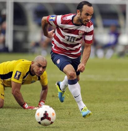 July 21, 2013 - Baltimore, Maryland, U.S. - USA s LANDON DONOVAN takes the ball around El Salvador goalkeeper DAGOBERTO PORTILLO GAMERO during the second half of the Gold Cup quarterfinals. USA won, 5-1. Soccer 2013 - USA Beats El Salvador 5-1 - ZUMAm67