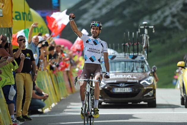 Christophe RIBLON ( FRA AG2R - La Mondiale ) gewinnt nach dem Husarenritt nach Alpe d Huez in der Tour de France eine Woche später auch bei der Polen Rundfahrt die Königsetappe - Aktion - quer - Jubel - Freude - Emotionen - Aktion - quer - Event: 70. Tour de Pologne - Tour of Poland - Polen Rundfahrt 2013 - 2.Etappe: Marilleva Vale di Sole nach Passo di Pordoi Val di Fassa 206.5 km - Location: Italien - Europa - Datum: 28.07.2013