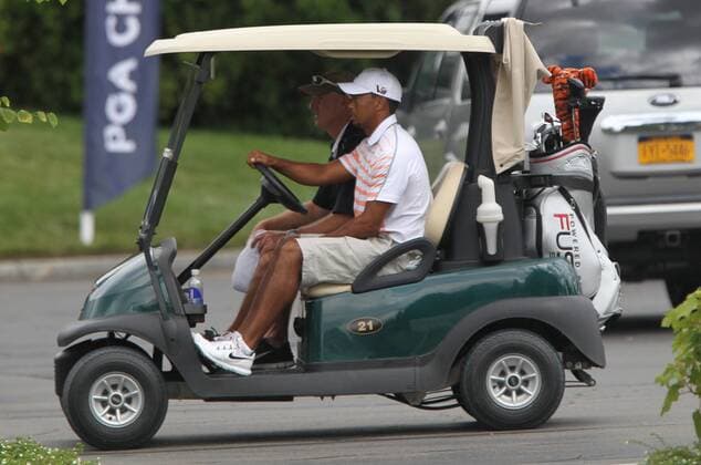 July 30, 2013 Tiger Woods with caddie Joe LaCava practices for the up coming PGA Golf Herren Championship Tournament at Oak HIll Country Club in Pittsford, NY. GOLF: JUL 30 PGA Golf Herren - PGA Golf Herren Championship - Practice Icon20135710 EDITORIAL USE ONLY