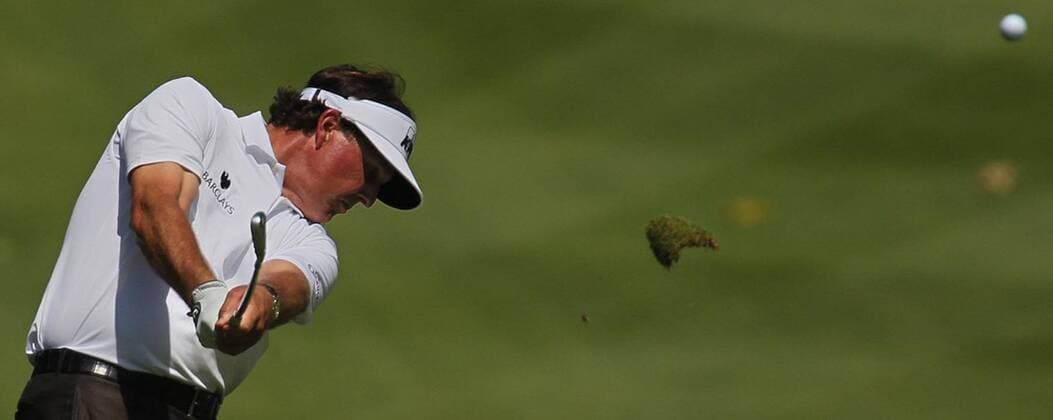 Aug. 1, 2013 - Akron, OH, USA - Phil Mickelson hits a shot from the fairway on the 6th hole during the opening round of the WGC-Bridgestone Invitational at Firestone Country Club in Akron, Ohio, on Thursday, August 1, 2013. WGC-Bridgestone Invitational - ZUMAm67