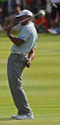 Aug. 3, 2013 - Akron, OH, USA - Tiger Woods reacts to a missed putt on the 15th hole during the third round of the WGC-Bridgestone Invitational at Firestone Country Club in Akron, Ohio, on Saturday, August 3, 2013. Woods carries a seven-shot lead heading into the final round. WGC-Bridgestone Invitational - ZUMAm67