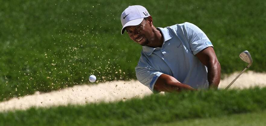 Aug. 3, 2013 - Akron, OH, USA - Tiger Woods hits from a bunker on the 7th hole during the third round of the WGC-Bridgestone Invitational at Firestone Country Club in Akron, Ohio, on Saturday, August 3, 2013. Woods carries a seven-shot lead heading into the final round. WGC-Bridgestone Invitational - ZUMAm67
