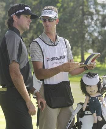 Aug. 3, 2013 - Akron, OH, USA - Bubba Watson and his caddy, Ted Scott, talk about the 16th hole during the third round of the WGC-Bridgestone Invitational at Firestone Country Club in Akron, Ohio, on Saturday, August 3, 2013. WGC-Bridgestone Invitational - ZUMAm67