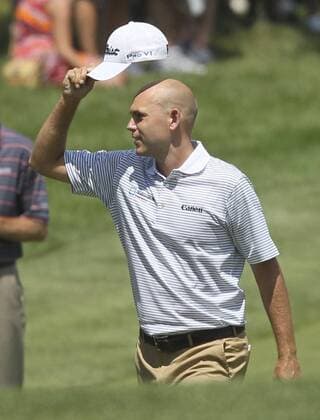 Aug. 3, 2013 - Akron, OH, USA - Bill Haas acknowledges fans on the 2nd fairway during the third round of the WGC-Bridgestone Invitational at Firestone Country Club in Akron, Ohio, on Saturday, August 3, 2013. WGC-Bridgestone Invitational - ZUMAm67