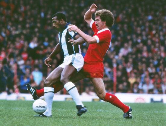 Football - 1978 1979 First Division - Liverpool 2 West Bromwich Albion 1 West Brom s Cyrille Regis is challenged by Liverpool s Graeme Souness at Anfield. 03 02 1979 