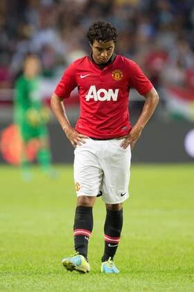 Rafael of Manchester United looks dejected as his side got 0-1 down - AIK Stockholm vs. Manchester United - Friendly - Stockholm - Sweden - 06 08 2013 Pic Philip Oldham Sportimage EDITORIAL USE ONLY. No use with unauthorised audio, video, data, fixture lists, club league logos or live services. Online in-match use limited to 120 images, no video emulation. No use in betting, games or single club league player publications.
