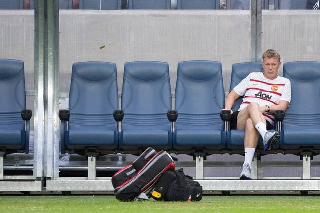 David Moyes, manager of Manchester United watches over warm up - AIK Stockholm vs. Manchester United - Friendly - Stockholm - Sweden - 06 08 2013 Pic Philip Oldham Sportimage EDITORIAL USE ONLY. No use with unauthorised audio, video, data, fixture lists, club league logos or live services. Online in-match use limited to 120 images, no video emulation. No use in betting, games or single club league player publications.