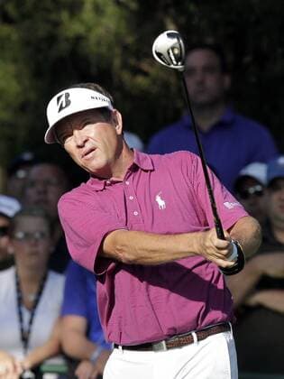 Davis Love III hits his tee shot on hole 10 in the first round of the PGA Golf Herren Championship at Oak Hill Country Club in Rochester, New York on August 8, 2013.  NYP20130808105