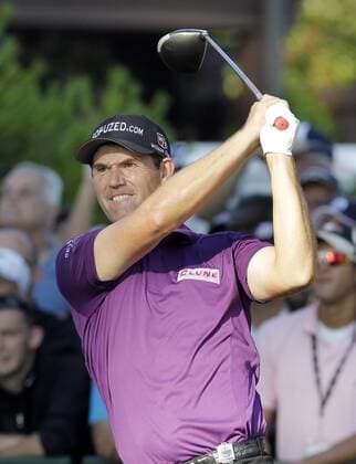 Padraig Harrington hits his tee shot on hole 10 in the first round of the PGA Golf Herren Championship at Oak Hill Country Club in Rochester, New York on August 8, 2013.  NYP20130808112