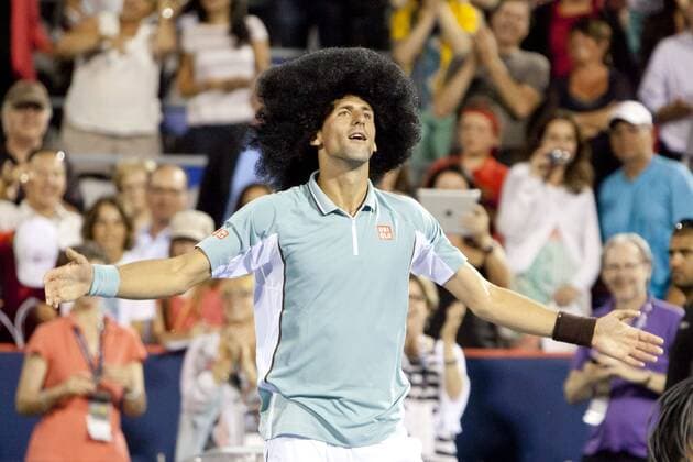 Aug. 08, 2013 - Montreal, Quebec, CAN - Novak Djokovic (SRB) wins his evening match during day 4 action and celebrates with a large wig and some dancing on centre court. Tennis 2013 - Rogers Cup - AUG 08 - ZUMAs30