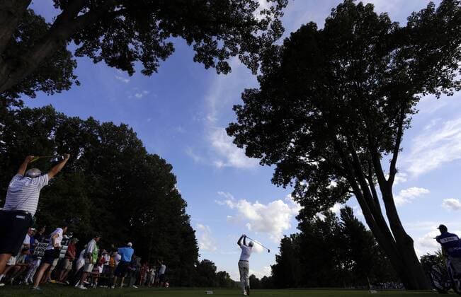 Jim Furyk hits his tee shot on the 16th hole in the second round of the PGA Golf Herren Championship at Oak Hill Country Club in Rochester, New York on August 9, 2013.  NYP20130809163