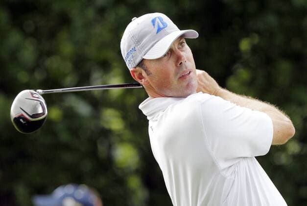 Matt Kuchar hits his tee shot on the 9th hole in the second round of the PGA Golf Herren Championship at Oak Hill Country Club in Rochester, New York on August 9, 2013.  NYP20130809167