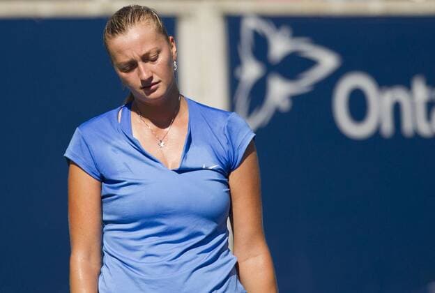 Petra Kvitova of the Czech Republic reacts during the quarterfinal of women s singles at the 2013 Rogers Cup in Toronto, Canada, Aug. 9, 2013. (Xinhua Zou Zheng) (SP)CANADA-TORONTO-TENNIS-WTA-ROGERS CUP-QUARTERFINAL 