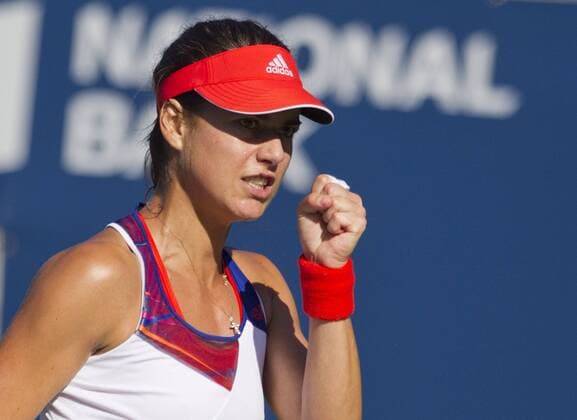 Sorana Cirstea of Romania jubilates after the quarterfinal of women s singles at the 2013 Rogers Cup in Toronto, Canada, Aug. 9, 2013. (Xinhua Zou Zheng) (SP)CANADA-TORONTO-TENNIS-WTA-ROGERS CUP-QUARTERFINAL 