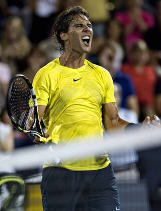 Rafael Nadal of Spain reacts during the quarterfinal of men s singles at the 2013 Rogers Cup in Montreal, Canada, Aug. 9, 2013. Nadal won the match 2-0. (Xinhua Andrew Soong) (SP)CANADA-MONTREAL-TENNIS-ROGERS CUP 