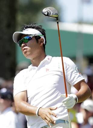 Hideki Matsuyama hits a tee shot on the 14th hole in the third round of the PGA Golf Herren Championship at Oak Hill Country Club in Rochester, New York on August 10, 2013.  NYP20130810119