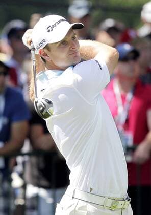 Justin Rose tees off on the 1st hole in the third round of the PGA Golf Herren Championship at Oak Hill Country Club in Rochester, New York on August 10, 2013.  NYP20130810126