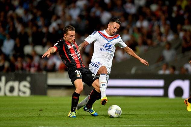 Miguel Lopes (lyo) - Eric Bautheac (nic) FOOTBALL : Lyon vs Nice - Ligue 1 - 10 08 2013 AnthonyBIBARD FEP Panoramic 