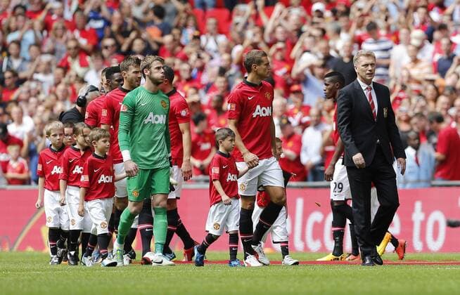 Manchester United s David Moyes leads out his side Manchester United v Wigan Athletic - FA Community Shield - Wembley - London - England -11 08 2013 - Pic David Klein Sportimage EDITORIAL USE ONLY. No use with unauthorised audio, video, data, fixture lists, club league logos or live services. Online in-match use limited to 120 images, no video emulation. No use in betting, games or single club league player publications.
