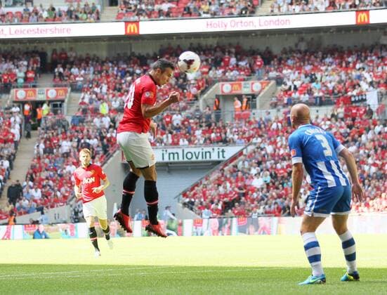 Manchester United s Robin Van Persie scoring his sides opening goal Manchester United v Wigan Athletic - FA Community Shield - Wembley - London - England -11 08 2013 - Pic David Klein Sportimage EDITORIAL USE ONLY. No use with unauthorised audio, video, data, fixture lists, club league logos or live services. Online in-match use limited to 120 images, no video emulation. No use in betting, games or single club league player publications.