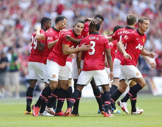 Manchester United s Robin Van Persie celebrates scoring his sides opening goal Manchester United v Wigan Athletic - FA Community Shield - Wembley - London - England -11 08 2013 - Pic David Klein Sportimage EDITORIAL USE ONLY. No use with unauthorised audio, video, data, fixture lists, club league logos or live services. Online in-match use limited to 120 images, no video emulation. No use in betting, games or single club league player publications.
