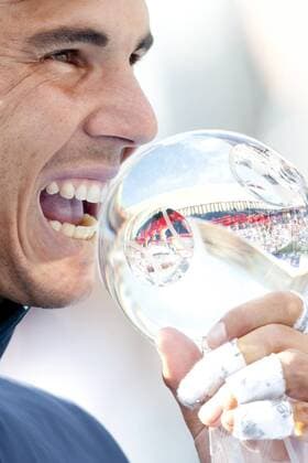 Aug. 11, 2013 - Montreal, Quebec, CAN - Rafael Nadal puts his signature bite on the Rogers Cup trophy after winning the men s singles finals on championship Sunday in straight sets, 6-2, 6-2. Tennis 2013 - Rogers Cup Finals- AUG 11 - ZUMAs30