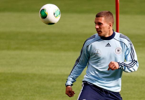 13.08.2013, xsvx, Fussball Deutsche Fussball Nationalmannschaft Training, v.l. Lukas Podolski (Deutsche Fussball Nationalmannschaft DFB) Freisteller