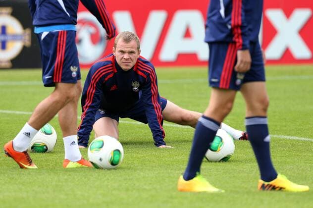 ITAR-TASS: BELFAST, UK. AUGUST 13, 2013. Russia s Alexander Anyukov at a training session of the Russian national football team for the 2014 FIFA World Cup qualifying match against Northern Ireland, at Windsor Park Stadium.  premiumd RE125394