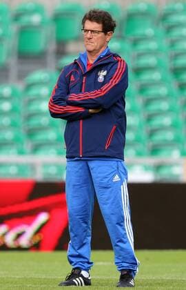 ITAR-TASS: BELFAST, UK. AUGUST 13, 2013. Russia s head coach Fabio Capello at a training session of the Russian national football team for the 2014 FIFA World Cup qualifying match against Northern Ireland, at Windsor Park Stadium.  premiumd RE125398