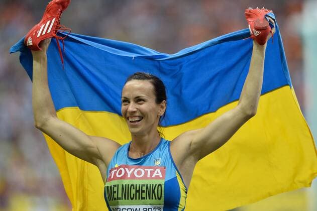 Ganna Melnichenko of Ukraine celebrates after the women s heptathlon in Day 4 of the 14th IAAF World Athletics Championships Moscow 2013 at Luzhniki Stadium in Moscow, Russia on Aug. 13, 2013. (Xinhua Jia Yuchen) (SP)RUSSIA-MOSCOW-ATHLETICS-IAAF WORLD CHAMPIONSHIPS 
