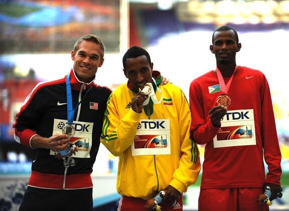 MOSCOW, Aug. 15, 2013 - Silver medalist Nick Symmonds of the United States, gold medallist Mohammed Aman of Ethopia and bronze medallist Ayanleh Souleiman of Djibouti (L-R) pose during the victory ceremony for the men s 800 metres at the IAAF World Athletics Championships at the Luzhniki stadium in Moscow Aug. 15, 2013. (Xinhua Dai Tianfang) (SP)RUSSIA-MOSCOW-ATHLETICS-IAAF WORLD CHAMPIONSHIPS 