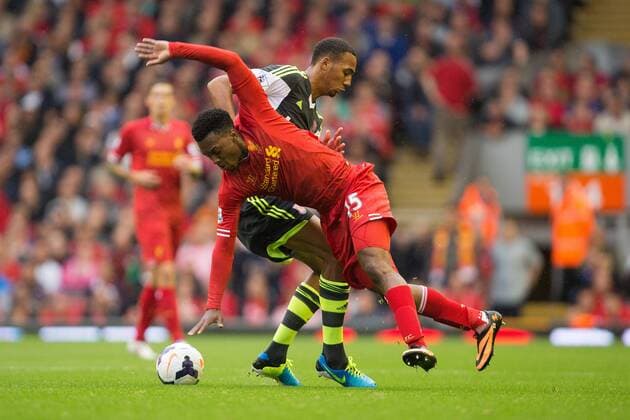 Stoke s Steven N Zonzi challenges Daniel Sturridge of Liverpool - Liverpool vs. Stoke City - Premier League - Anfield - Liverpool - 17 08 2013 Pic Philip Oldham Sportimage EDITORIAL USE ONLY. No use with unauthorised audio, video, data, fixture lists, club league logos or live services. Online in-match use limited to 120 images, no video emulation. No use in betting, games or single club league player publications.